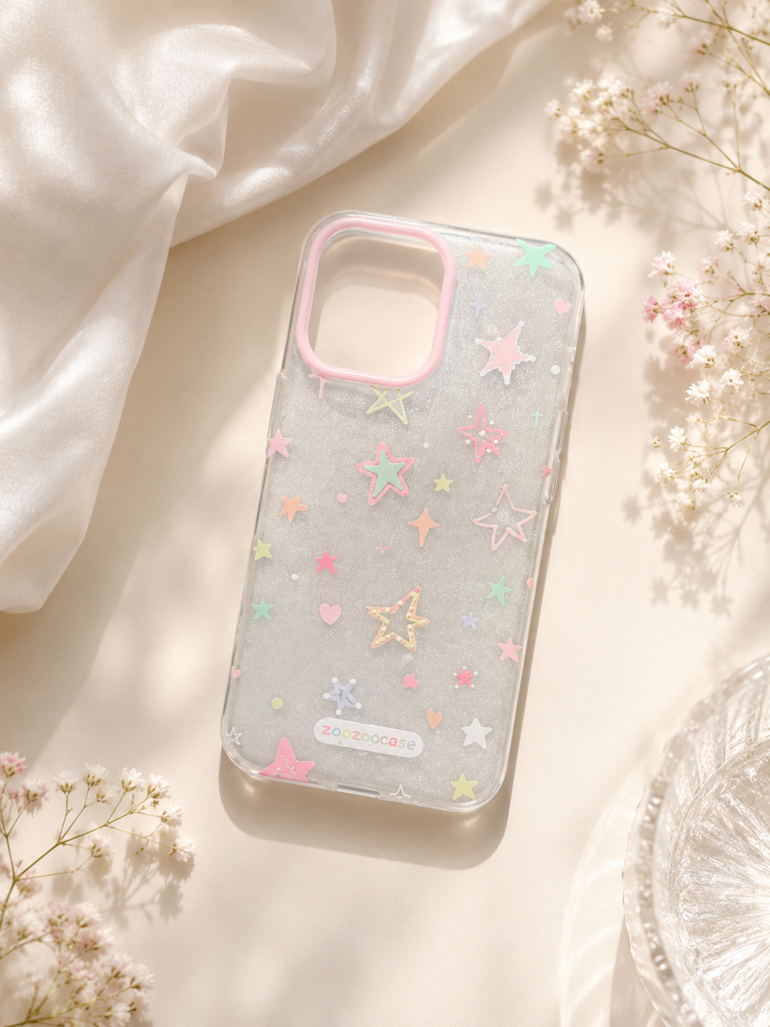  phone case with star designs on a light background