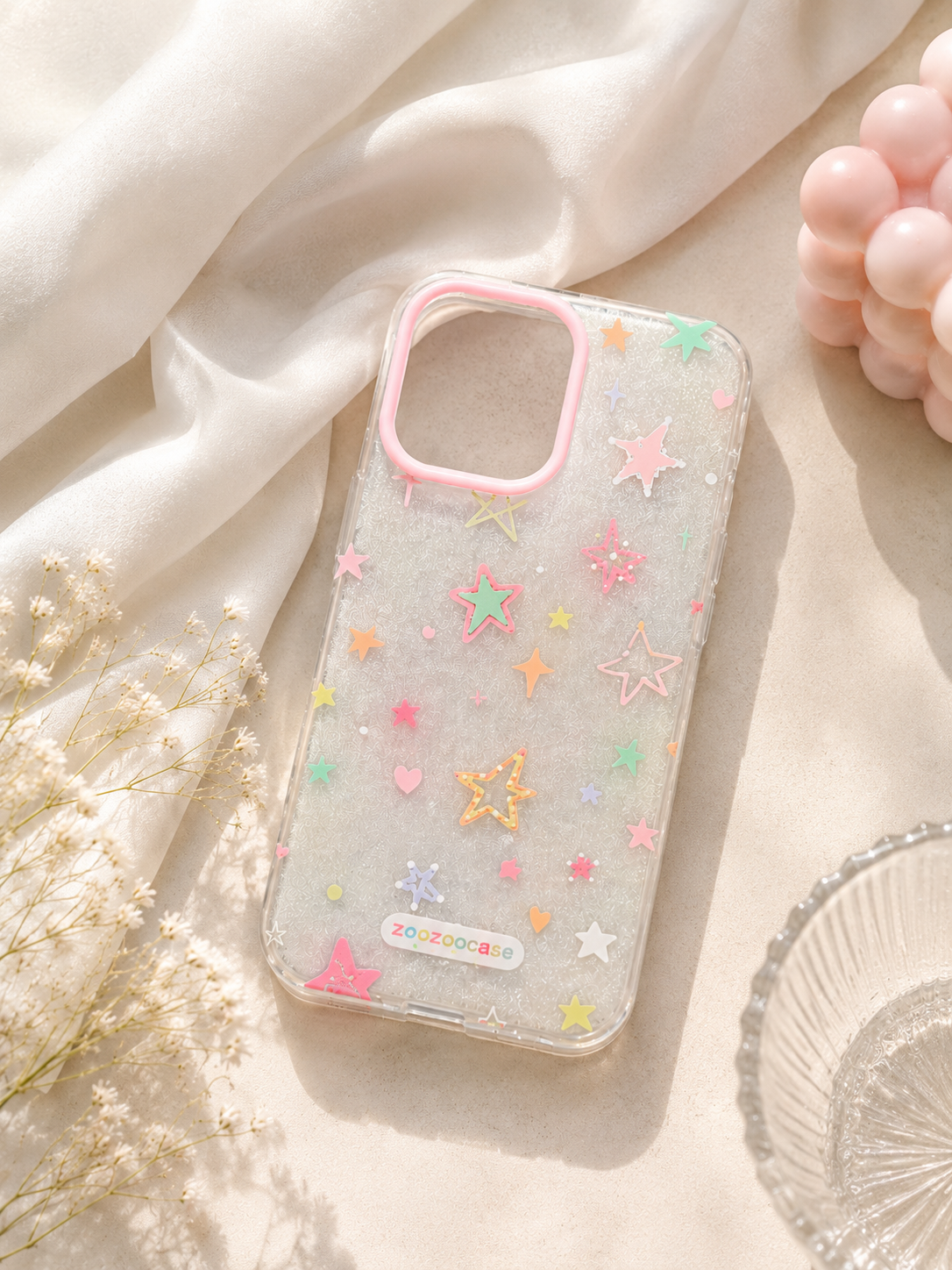  phone case with star designs on a light background