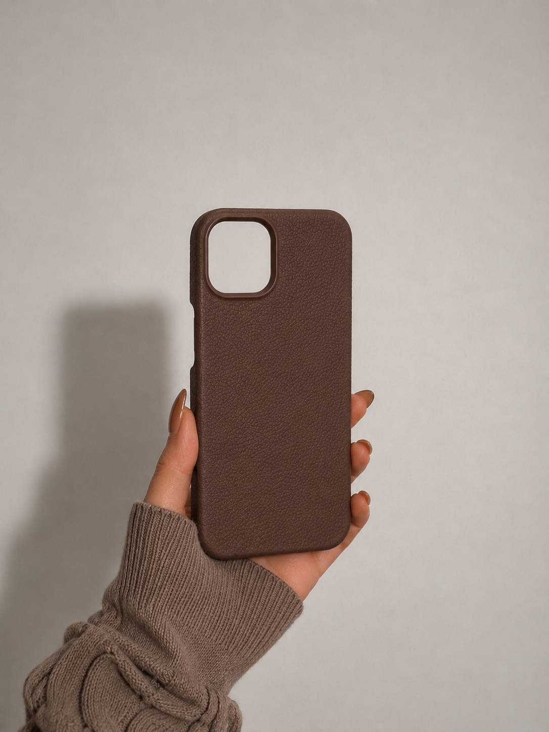 Brown leather iPhone case with premium textured finish